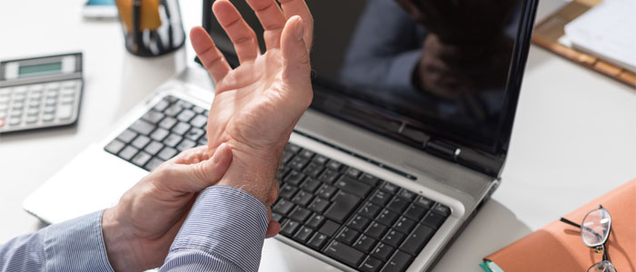 a picture of a person holding their wrist